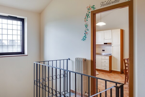 Foto van Authentieke boerderij in Sant'Angelo in Vado met zwembad - Landing