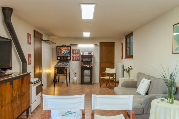 Foto van Luxe verblijf met tuin - Vakantiehuis in Monte San Martino - LivingRoom