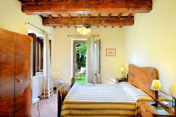 Foto van Luxe verblijf met tuin - Vakantiehuis in Monte San Martino - BedRoom