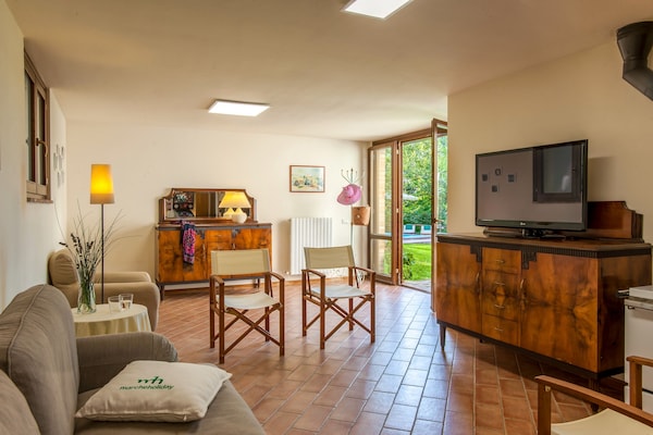Foto van Luxe verblijf met tuin - Vakantiehuis in Monte San Martino - LivingRoom