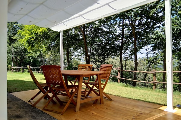 Foto van Luxe verblijf met tuin - Vakantiehuis in Monte San Martino - TerraceBalcony