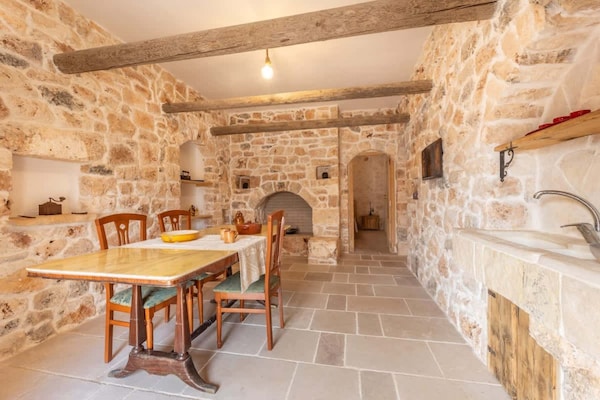 Foto van Rustieke landhuisvilla voor 17 met zwembad - Vakantiehuis in Ceglie Messapica - DiningRoom