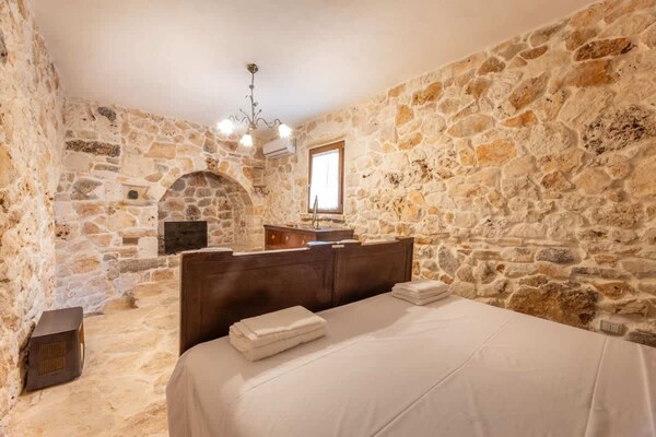 Foto van Rustieke landhuisvilla voor 17 met zwembad - Vakantiehuis in Ceglie Messapica - BedRoom