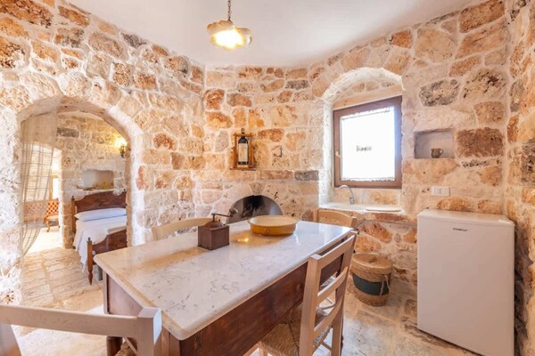 Foto van Rustieke landhuisvilla voor 17 met zwembad - Vakantiehuis in Ceglie Messapica - DiningRoom