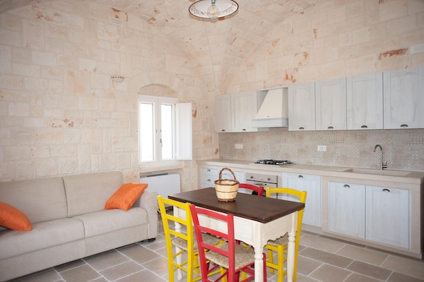 Foto van Torenhuis in Puglia met Zwembad - Vakantiehuis in Cisternino - LivingRoom