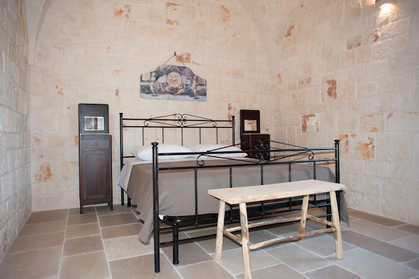 Foto van Torenhuis in Puglia met Zwembad - Vakantiehuis in Cisternino - BedRoom
