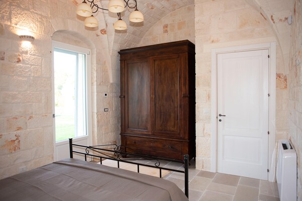 Foto van Torenhuis in Puglia met Zwembad - Vakantiehuis in Cisternino - BedRoom