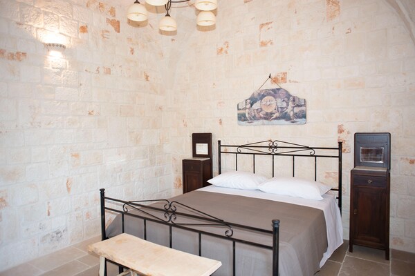 Foto van Torenhuis in Puglia met Zwembad - Vakantiehuis in Cisternino - BedRoom