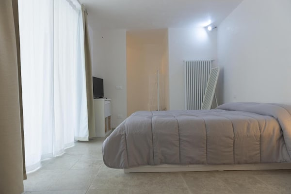 Foto van Villa bij Cisternino met zwembad en boomgaard - Vakantiehuis in Cisternino - BedRoom
