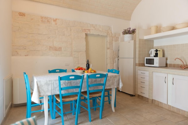Foto van Villa in Itria-vallei met Infinity Pool - Vakantiehuis in Cisternino - DiningRoom