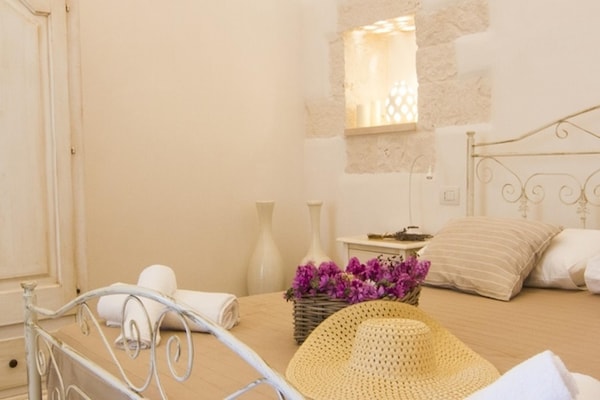 Foto van Villa in Itria-vallei met Infinity Pool - Vakantiehuis in Cisternino - BedRoom