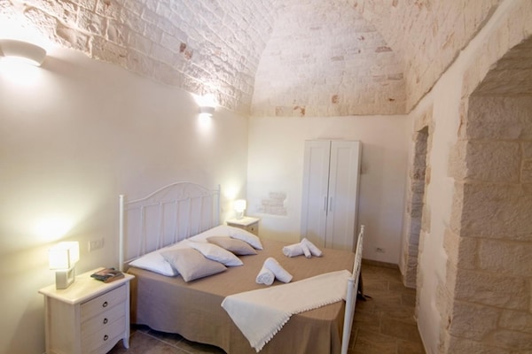 Foto van Villa in Itria-vallei met Infinity Pool - Vakantiehuis in Cisternino - BedRoom