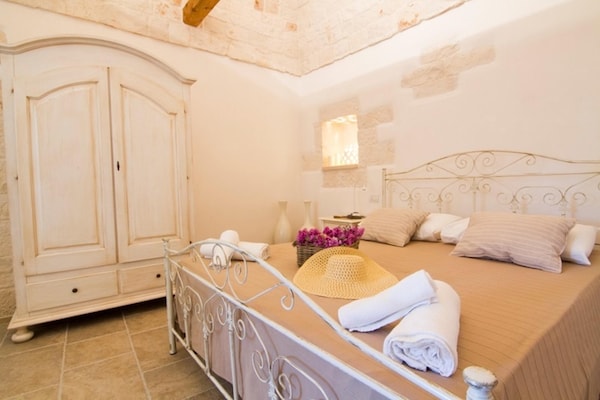 Foto van Villa in Itria-vallei met Infinity Pool - Vakantiehuis in Cisternino - BedRoom