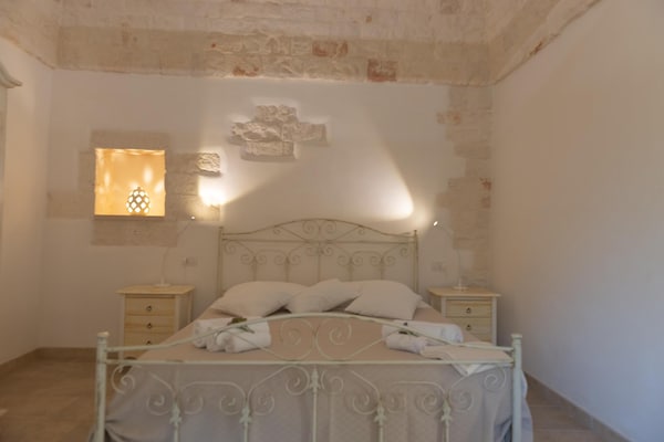 Foto van Villa in Itria-vallei met Infinity Pool - Vakantiehuis in Cisternino - BedRoom