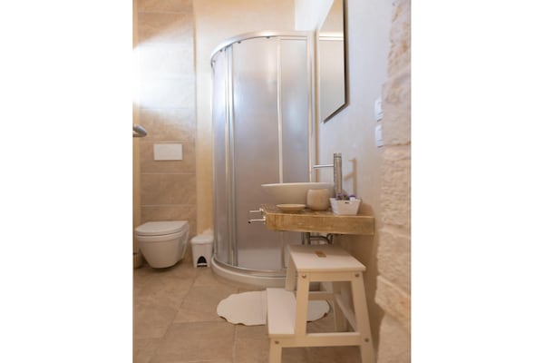 Foto van Villa in Itria-vallei met Infinity Pool - Vakantiehuis in Cisternino - BathRoom