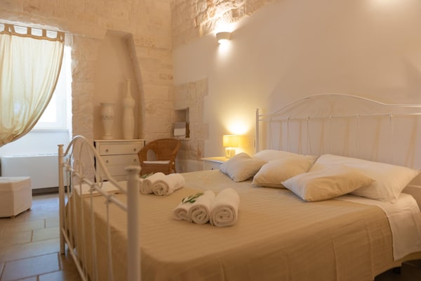 Foto van Villa in Itria-vallei met Infinity Pool - Vakantiehuis in Cisternino - BedRoom