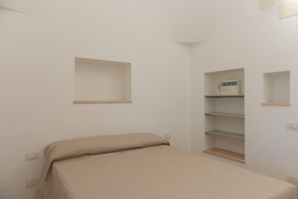 Foto van Trullo in Puglia met Zwembad en Uitzicht - Vakantiehuis in Ostuni - BedRoom