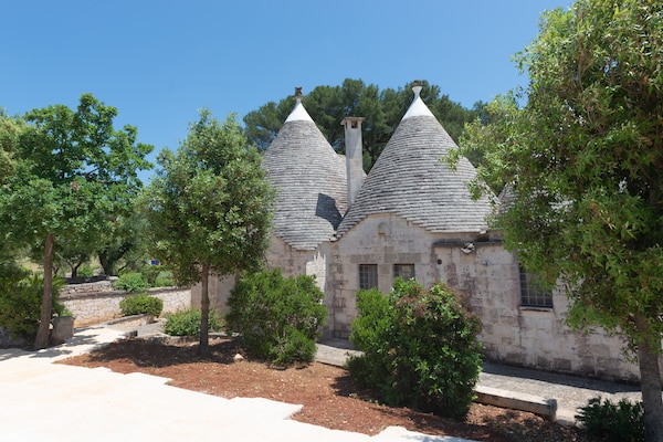 Foto van Trullo in Puglia met Zwembad en Uitzicht - Vakantiehuis in Ostuni - ExteriorSummer