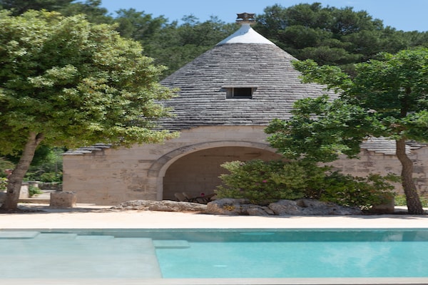 Foto van Trullo in Puglia met Zwembad en Uitzicht - Vakantiehuis in Ostuni - ExteriorSummer