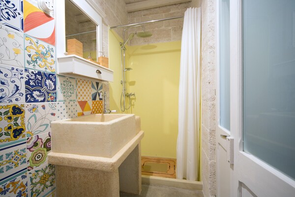 Foto van Vrijstaand Trullo-landgoed in Torre Suda - Vakantiehuis in Racale - BathRoom