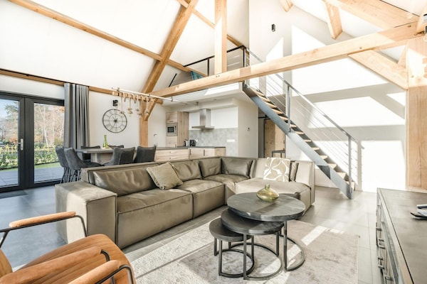 Foto van Bungalow met uitzicht op vijver - Vakantiehuis in Baarle-nassau - LivingRoom