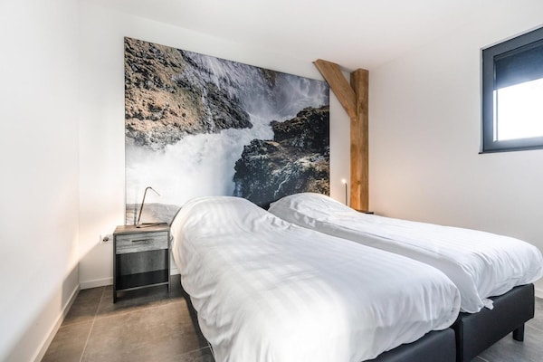 Foto van Bungalow met uitzicht op vijver - Vakantiehuis in Baarle-nassau - BedRoom