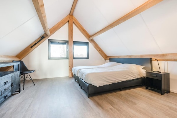 Foto van Bungalow met uitzicht op vijver - Vakantiehuis in Baarle-nassau - BedRoom