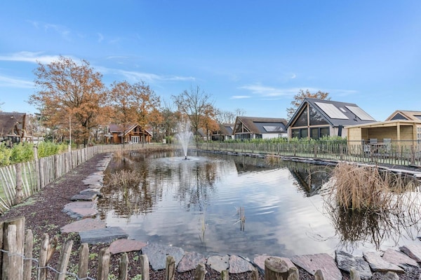 Foto van Bungalow met uitzicht op vijver - Vakantiehuis in Baarle-nassau - GardenSummer