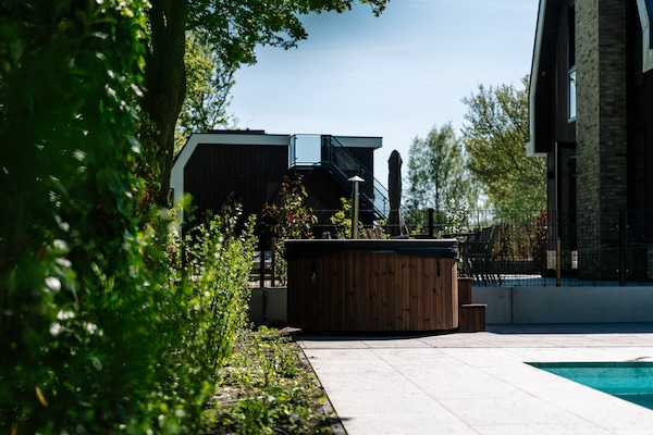 Foto van Verblijf met privézwembad en hot tub - Vakantiehuis in Waarland - Facilities