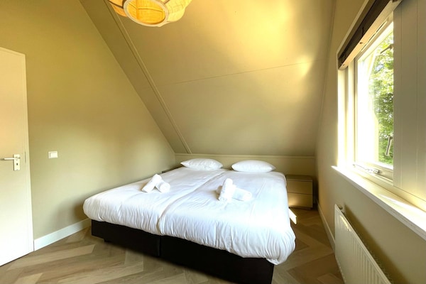 Foto van Gezellig vakantiehuis voor 6 met open haard. - Vakantiehuis in Sint Maarten - BedRoom