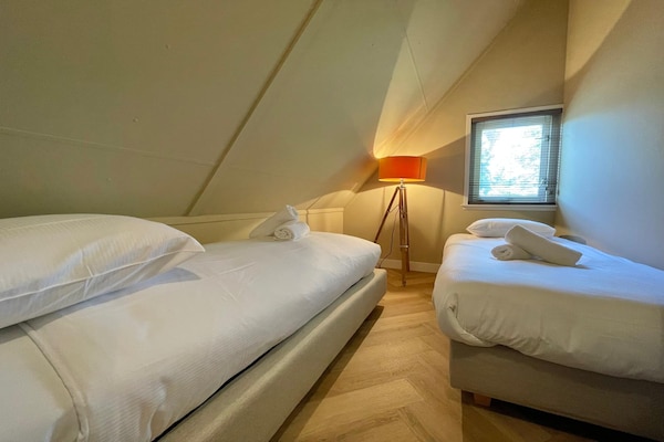 Foto van Gezellig vakantiehuis voor 6 met open haard. - Vakantiehuis in Sint Maarten - BedRoom
