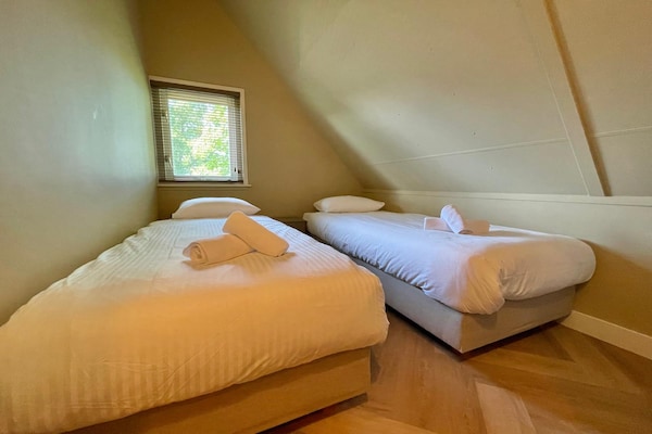 Foto van Gezellig vakantiehuis voor 6 met open haard. - Vakantiehuis in Sint Maarten - BedRoom