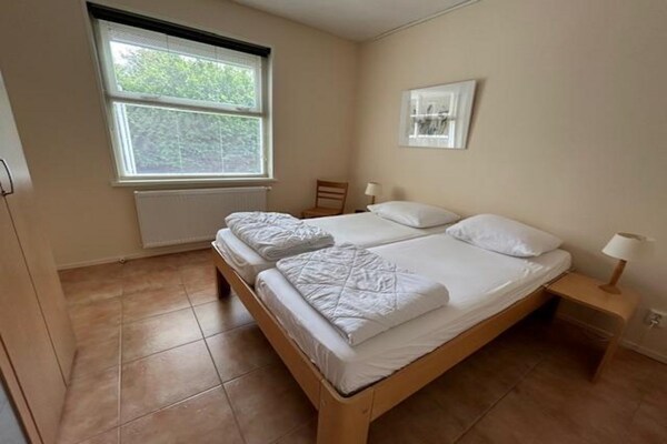 Foto van Comfortabele familiebungalow vlakbij het strand - Vakantiehuis in Sint Maartenszee - BedRoom