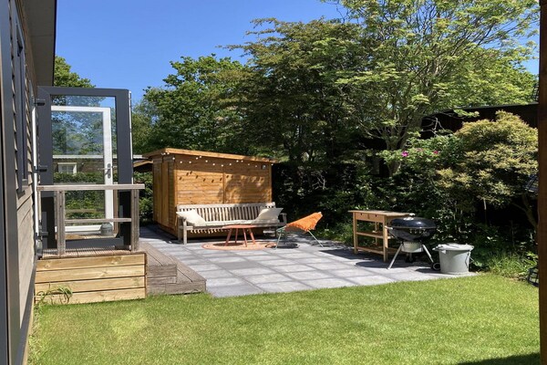 Foto van Modern chalet met tuin en terras - Vakantiehuis in Sint Maartenszee - TerraceBalcony
