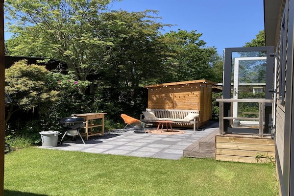 Foto van Modern chalet met tuin en terras - Vakantiehuis in Sint Maartenszee - TerraceBalcony