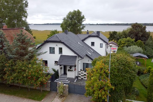 Foto van Vakantiehuis in Dziwnowek met Zwembad en Strand - Vakantiehuis in Dziwnowek - ExteriorSummer