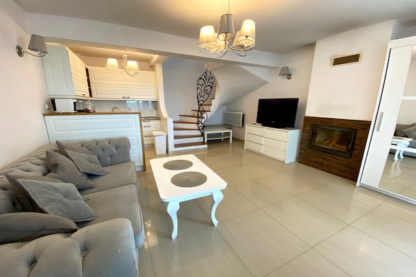 Foto van Vakantiehuis in Dziwnowek met Zwembad en Strand - Vakantiehuis in Dziwnowek - LivingRoom