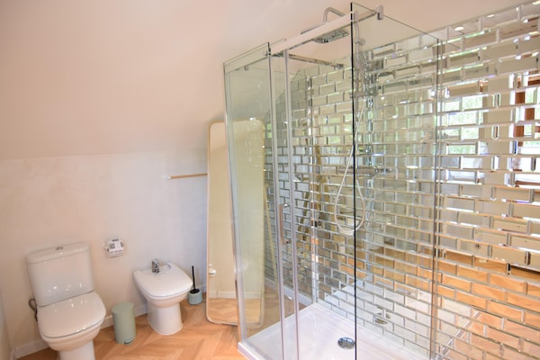 Foto van Grote vakantievilla met sauna, jacuzzi en zwembad. - BathRoom