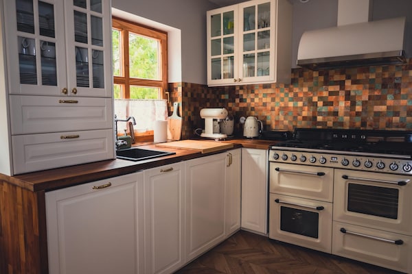 Foto van Grote vakantievilla met sauna, jacuzzi en zwembad. - Kitchen