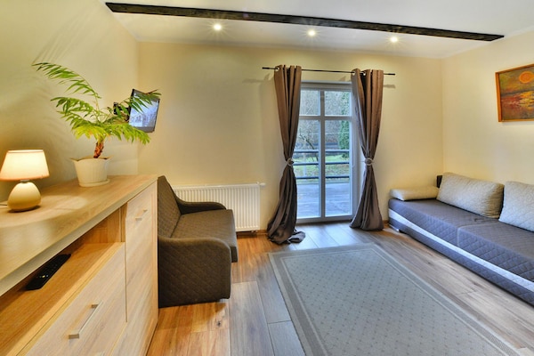 Foto van Vakantiehuis in het bos, privétuin, sauna - Vakantiehuis in Polanow - LivingRoom