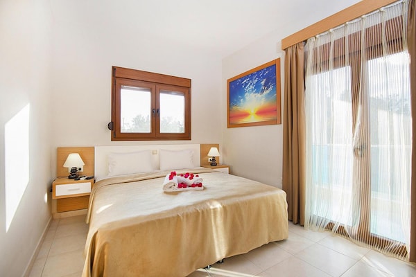Foto van Vakantiehuis in Kiotari vlak bij het strand - Vakantiehuis in Kiotari - BedRoom