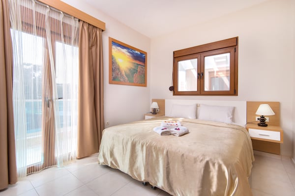 Foto van Vakantiehuis in Kiotari met een barbecue - Vakantiehuis in Kiotari - BedRoom