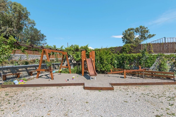 Foto van Vakantiehuis in Kiotari met een barbecue - Vakantiehuis in Kiotari - GardenSummer